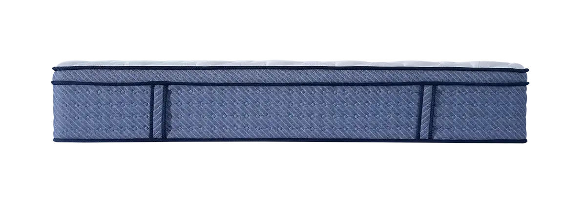 Side view of a blue premium mattress with quilted fabric and edge support.
