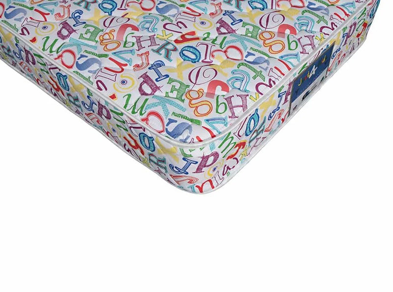 Kids mattress with colorful alphabet print, corner view, bedroom furniture